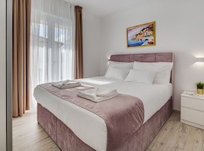 1 habitación, acceso a internet y ropa de cama
