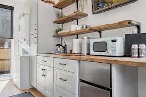 Microwave, toaster, blender, cookware/dishes/utensils