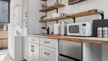 Fridge, microwave, coffee/tea maker, toaster