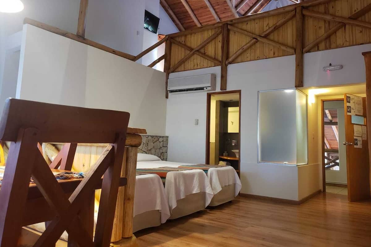 Suite, Garden View | Premium bedding, in-room safe, desk, laptop workspace