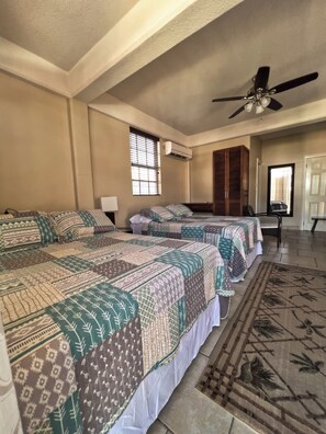 Standard Studio Suite, 2 Double Beds, Non Smoking, Kitchenette | Desk, laptop workspace, iron/ironing board, free WiFi - Timbos Apartelle (Roseau)
