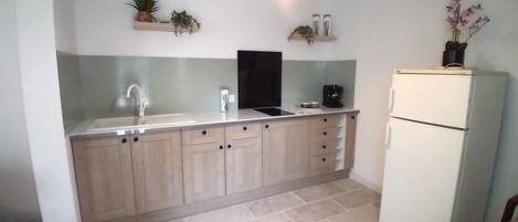 Microwave, stovetop, coffee/tea maker, cookware/dishes/utensils