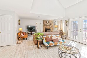 Smart TV, fireplace, table tennis, books