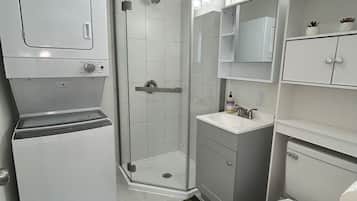 Shower, towels, soap, toilet paper