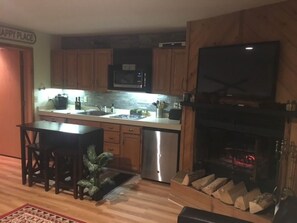 Fridge, microwave, stovetop, dishwasher - Golf course condo, 10 min to Torch Lake, w/pool, hot tub and sauna! (Mancelona)