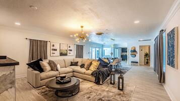 Deluxe House, 6 Bedrooms, Garden View | Living area | 55-inch Smart TV with digital channels, fireplace, Netflix