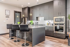 Fridge, microwave, oven, stovetop - [Family] Oak Lawn Luxe Stay- 4 King Beds, Hot Tub, Arcades, Pool Table & More (Dallas)