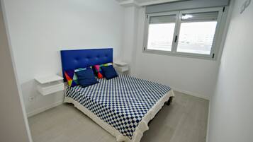 2 dormitorios, tabla de planchar con plancha, wifi y ropa de cama