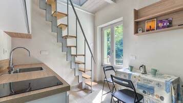 Fridge, stovetop, coffee/tea maker, cookware/dishes/utensils