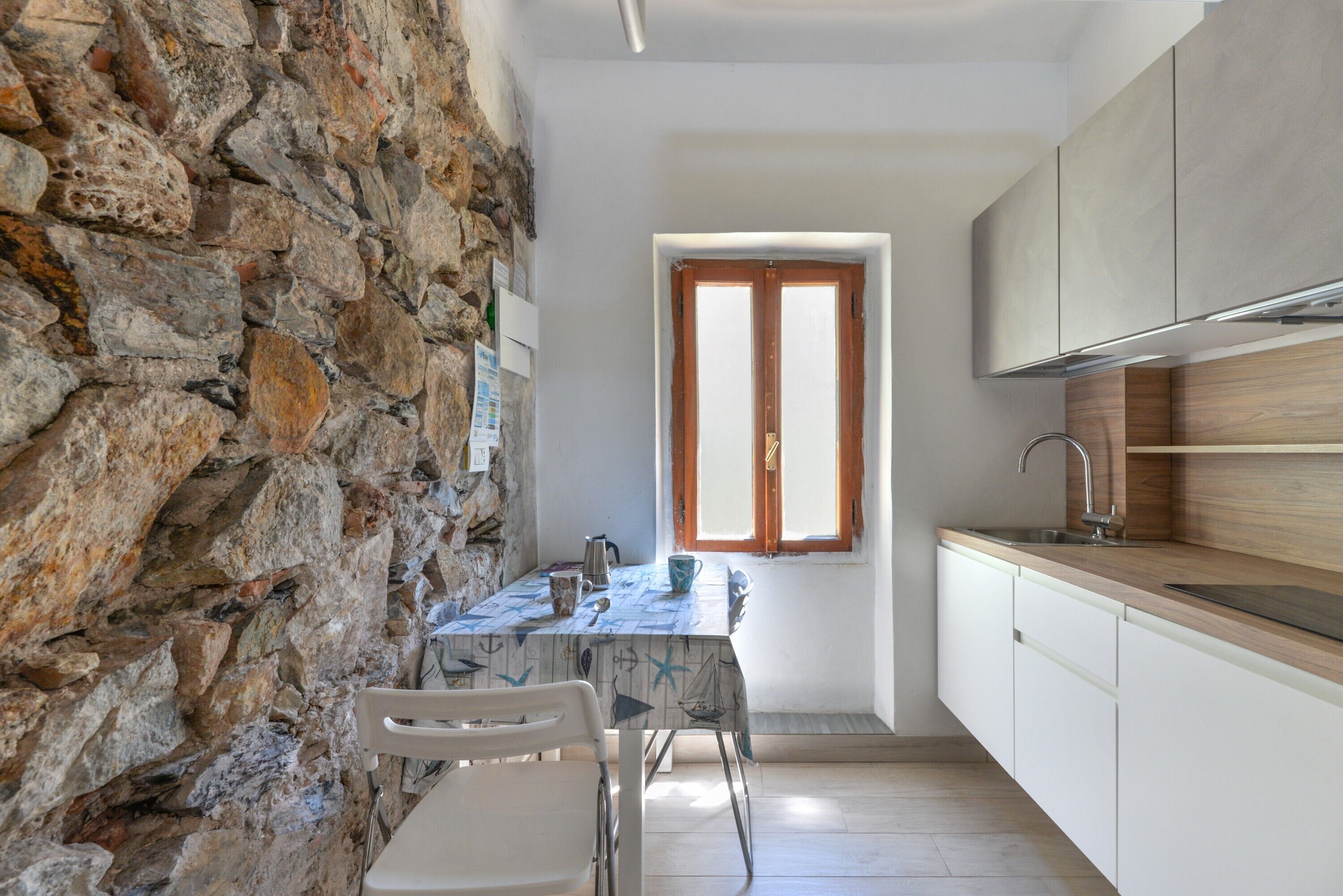 Fridge, stovetop, coffee/tea maker, cookware/dishes/utensils