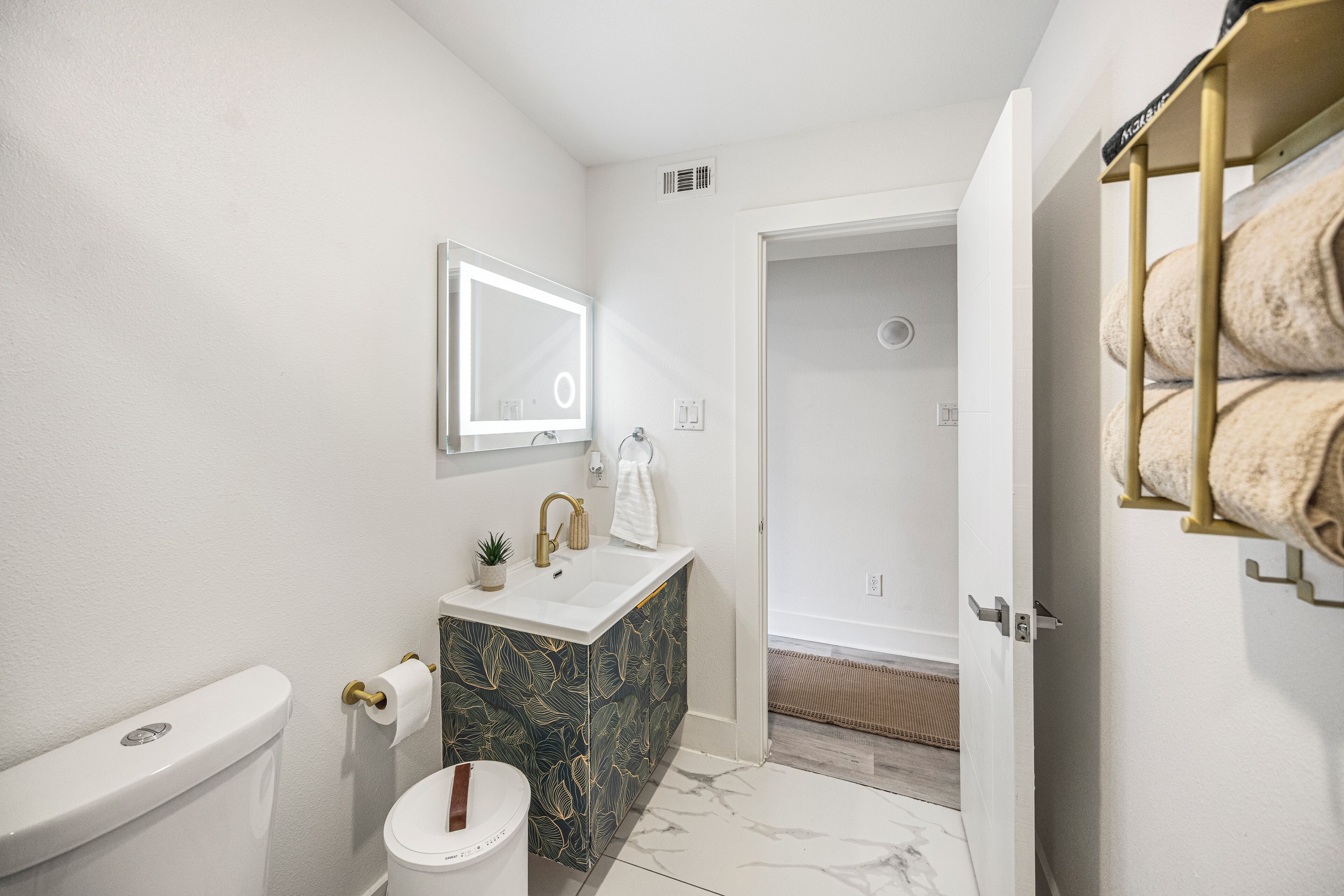 Hair dryer, towels, soap, toilet paper