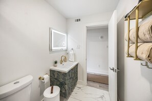 Hair dryer, towels, soap, toilet paper - Downtown Luxury Retreat -- Sofa bed + Bart cart + Towel Warmer + Washer/Dryer (Dallas)