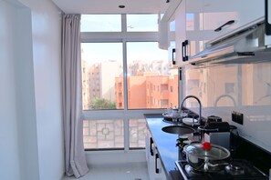 Fridge, microwave, oven, coffee/tea maker