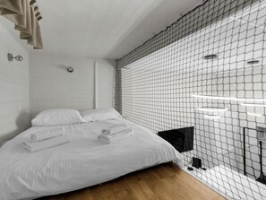 1 chambre, fer et planche à repasser, Wi-Fi, literie fournie