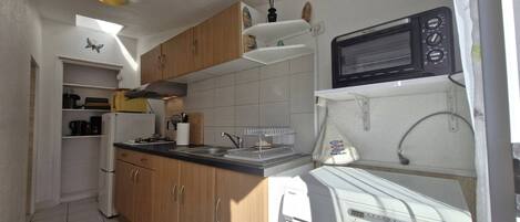 Fridge, microwave, toaster, cookware/dishes/utensils