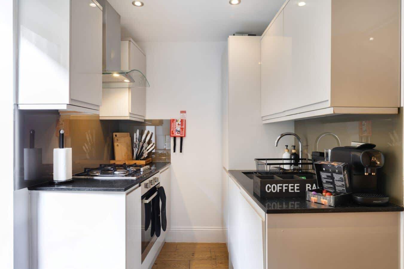Coffee/tea maker, fridge, microwave, oven