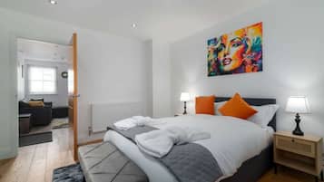 1 bedroom, desk, iron/ironing board, travel cot