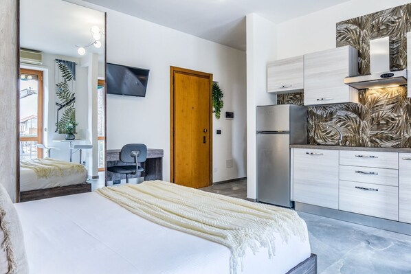1 habitación, tabla de planchar con plancha, wifi gratis y ropa de cama 
