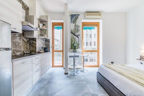 1 habitación, tabla de planchar con plancha, wifi gratis y ropa de cama 