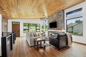 Smart TV, fireplace, foosball