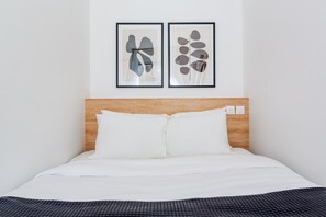 1 chambre, fer et planche Ă repasser, Wi-Fi, draps fournis
