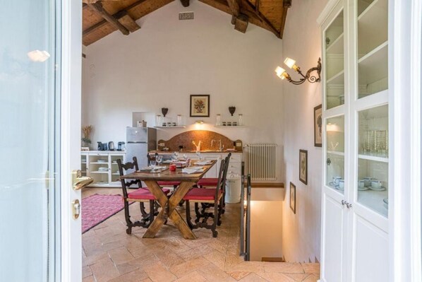 Dining - Confortable and stylish 90smq duplex apt that can accomodate up to 4 people located in a period building without a lift.Portion of private garden, large garden with shared pool and private parking space.Inside the building there is a historic religious b (Villa Guardia)