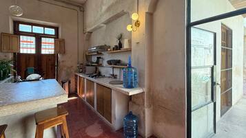 Fridge, microwave, stovetop, coffee/tea maker