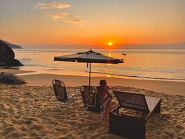 On the beach, beach shuttle, sun loungers, beach umbrellas