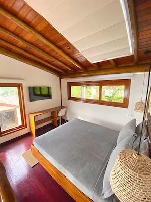 Loft conforto, vista para a praia | 1 quarto, cofres nos quartos, escrivaninha
