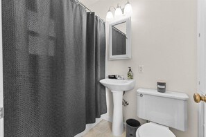 Hair dryer, towels, shampoo