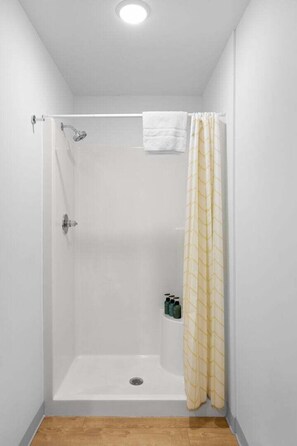 Shower, hair dryer - Craft District Apt w/ Gym & Coffee Shop 205 (Duluth)