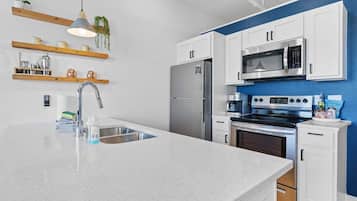 Coffee/tea maker, fridge, microwave, oven