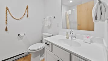 Regadera y secadora de cabello