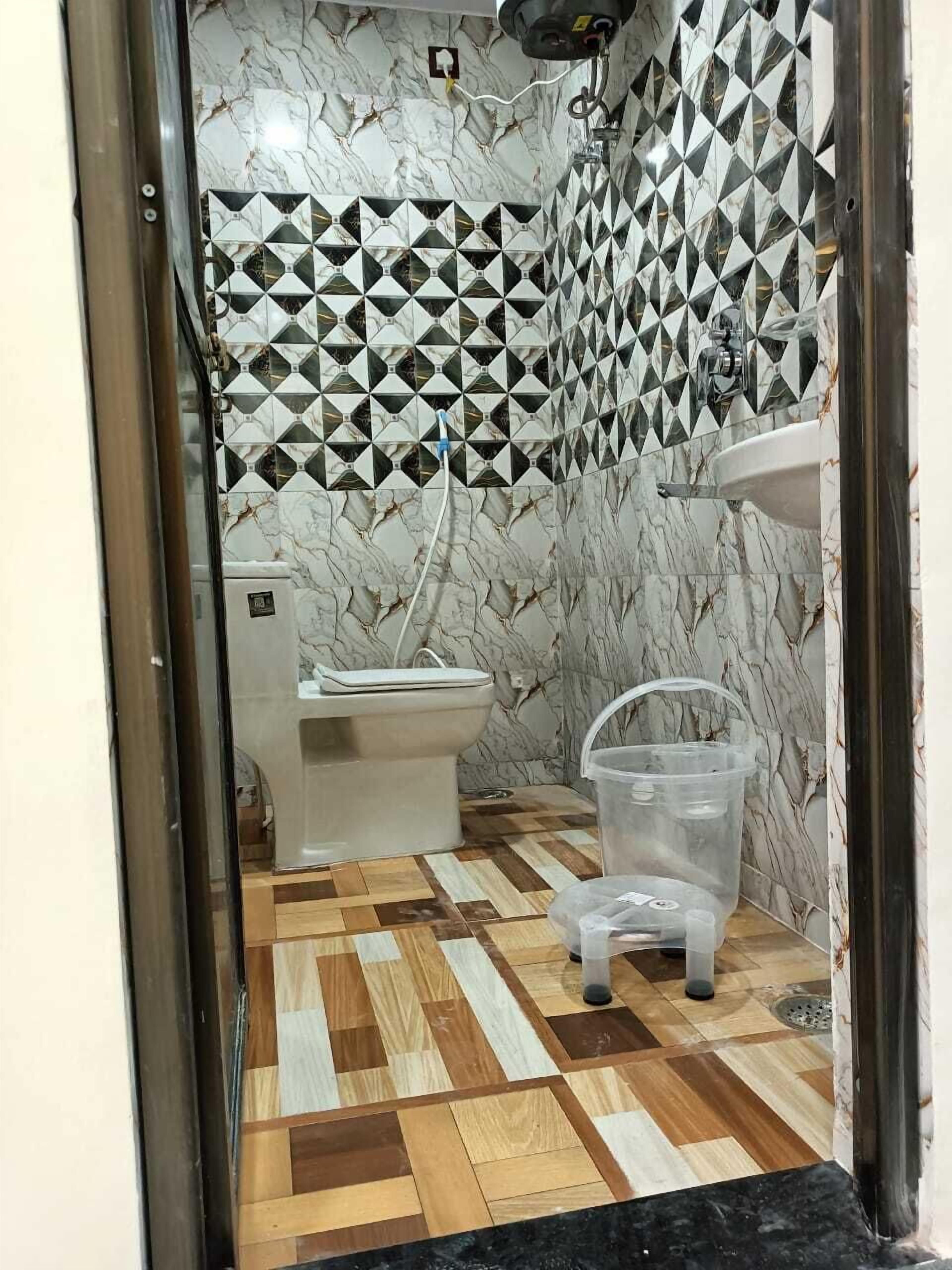 Separate bathtub and shower, towels, soap, shampoo