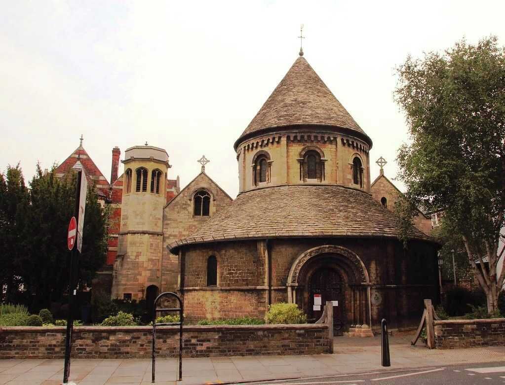 A historic church with a central dome and a bell tower.