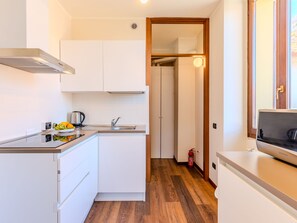 Fridge, microwave, cookware/dishes/utensils