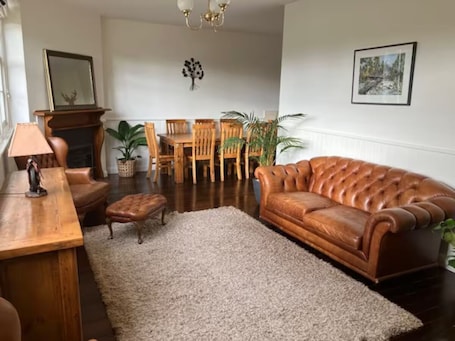 Living area. Library Cottage