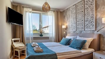 1 habitación, tabla de planchar con plancha, wifi gratis y ropa de cama