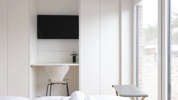 1 slaapkamer, een strijkplank/strijkijzer, gratis wifi, beddengoed