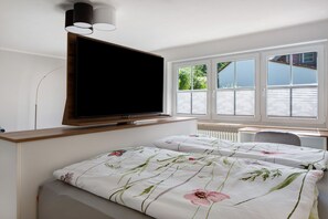 1 chambre, fer et planche à repasser, Wi-Fi gratuit, draps fournis