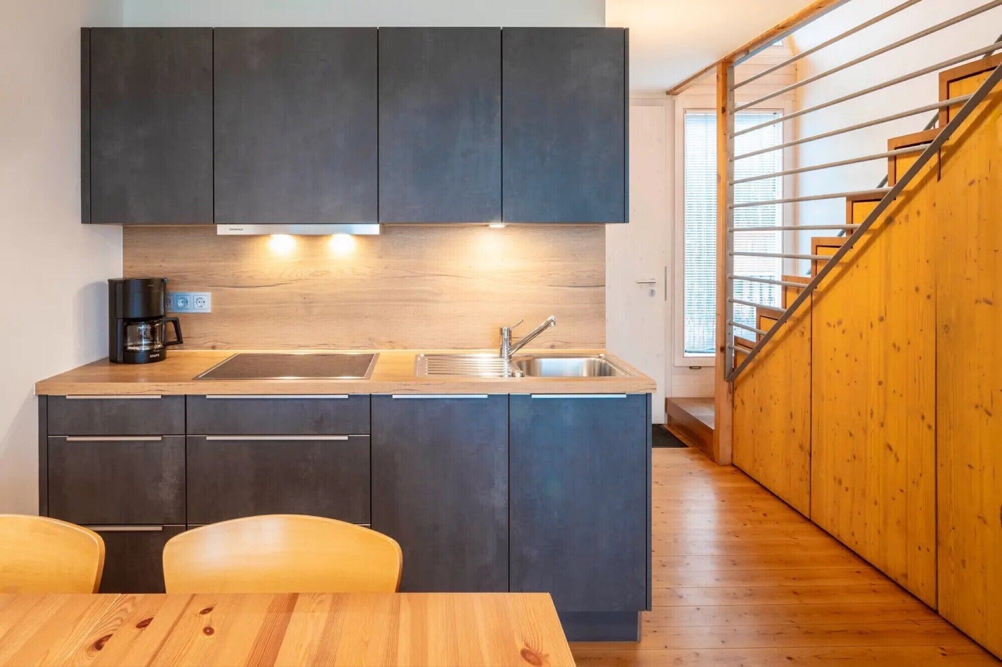 Fridge, stovetop, dishwasher, coffee/tea maker