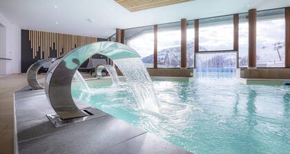 Apartment in Le Corbier with Spa & Pool