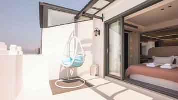Suíte superluxo, várias camas | Terraço/pátio