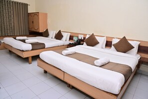 Family Quadruple Room, 2 Queen Beds, Balcony, Garden View | Desk - SWAMY RESORT (Shirdi)