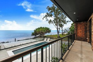 Terrace/patio - Enjoy exclusive use of this stunning oceanfront property accommodating up to 16. (Burrum Heads)