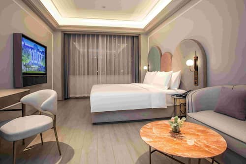 Premium bedding, down comforters, memory foam beds, free minibar