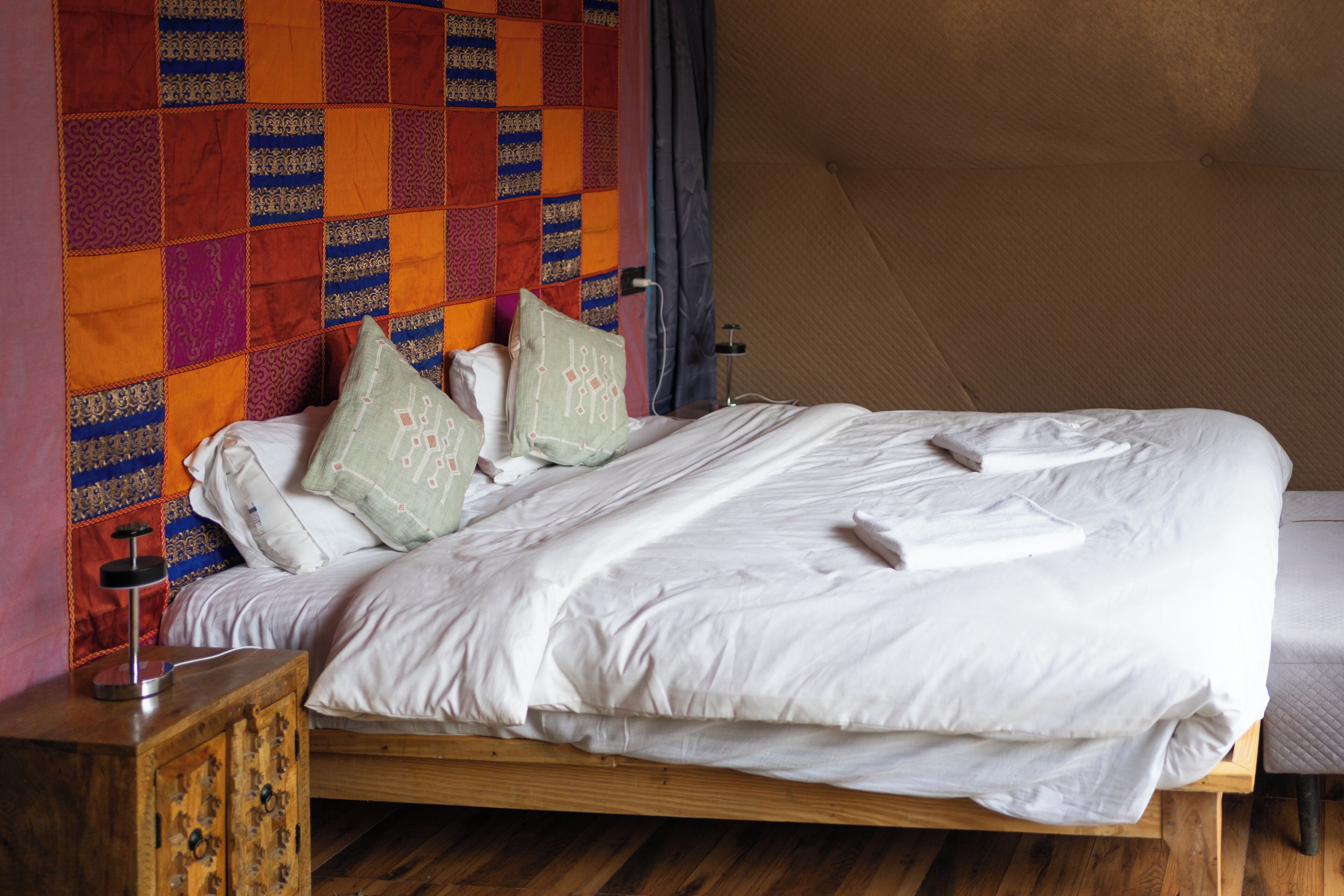 Premium bedding, down comforters, pillowtop beds, individually decorated