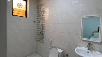 Shower, towels, soap, shampoo