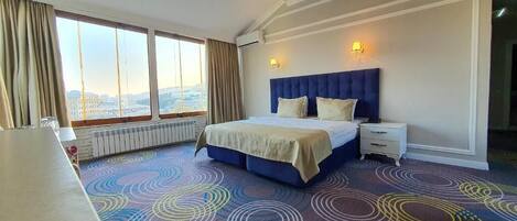Deluxe Double Room, City View | Premium bedding, minibar, in-room safe, individually decorated