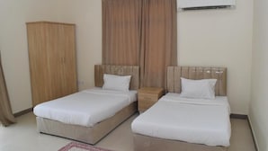 Basic Apartment | 2 bedrooms, iron/ironing board (on request), WiFi (free), bed sheets - Aknan 01 - Center Market (Salalah)